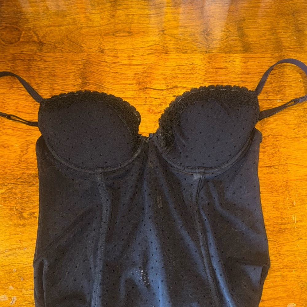 Black corset top with polka dots